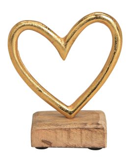 Golden aluminum heart on wooden stand