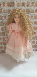 SIGNED PORCELAIN DOLL-COLLECTIBLE ITEM BY COURT OF DOLLS