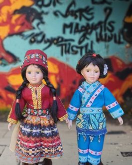 A PAIR OF ETHNIC DOLLS THE GIRL FROM LAPPLAND